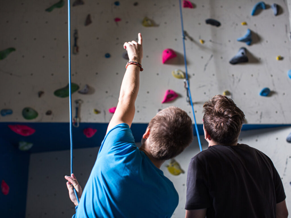 Rock climbing at Rock Out Climbing is one of the best Destin indoor activities.